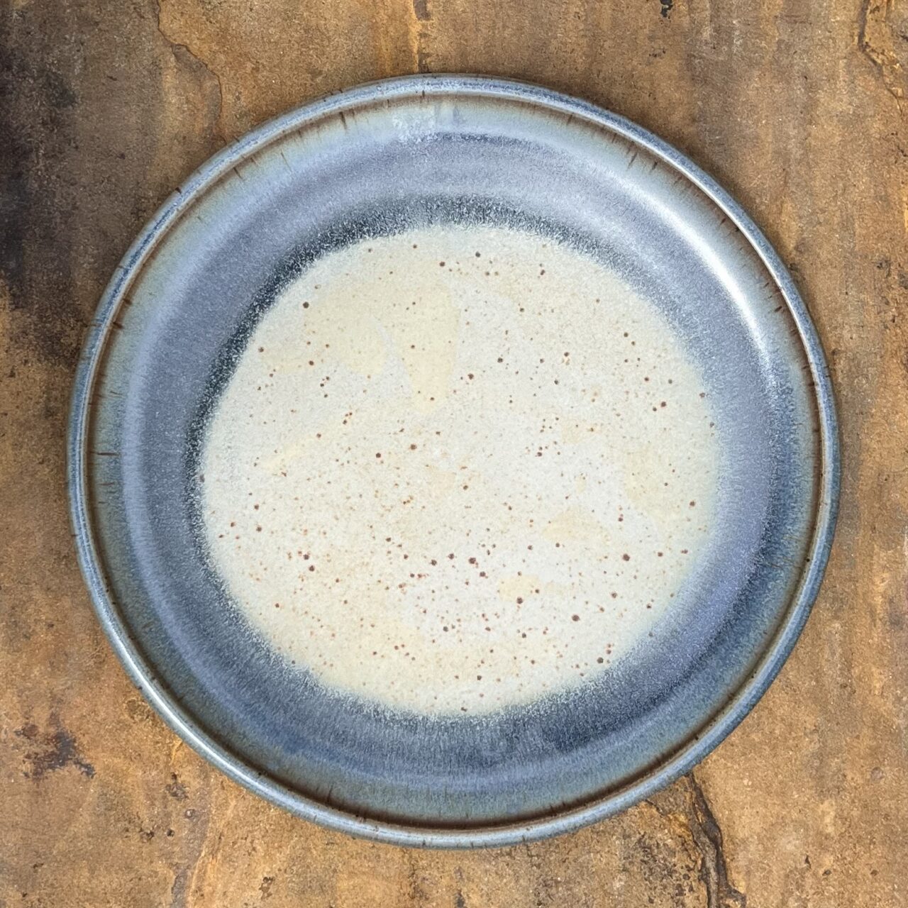 Julia Mann finished platter with blue texture and mamo glaze, birdseye view