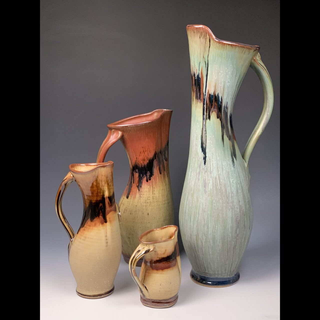 Sarah Wells Rolland finished pots grouping, dancing pitcher in various sizes