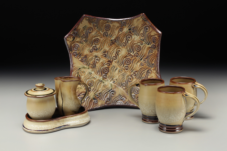 Sarah Wells Rolland finished pots grouping, mugs, jar and creamer set, hand built platter with texture, pumpkin and leach black glaze