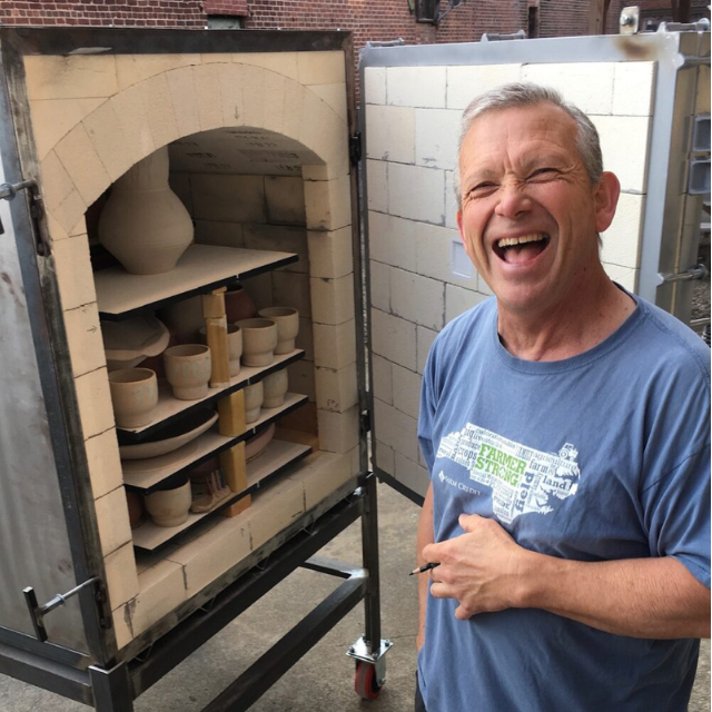 George Rolland square headshot with rolland kiln