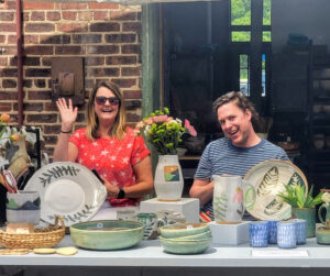Shapes of Summer show, ISM participant show, Missy Henry and Chad Caldwell at their booth, Independent Study and Mentoring Advanced Studies Program, cropped