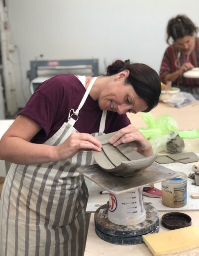 Angie Young, ISM student slab work, hand building, ISM studio